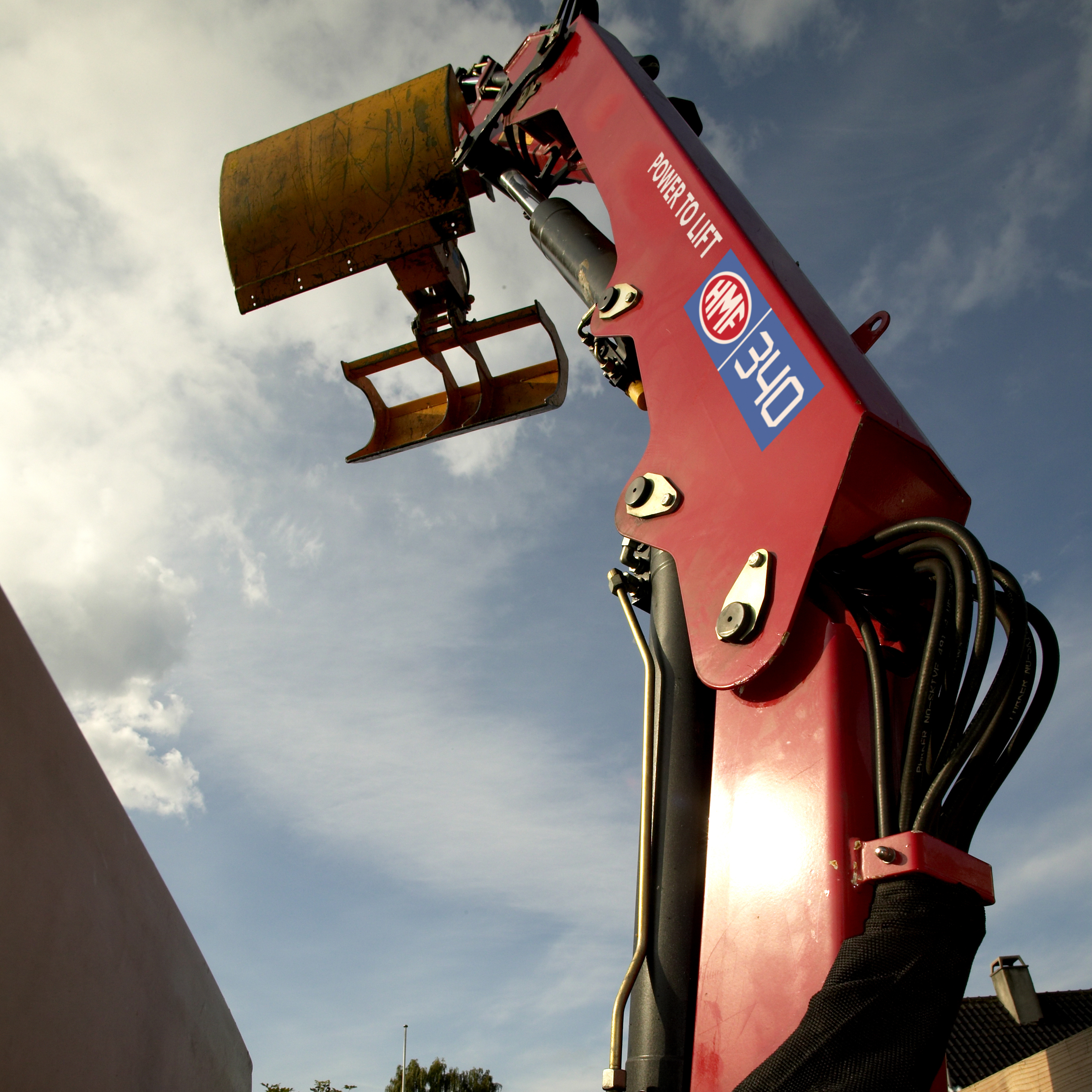 Petite grue chargeuse de 3 tonnes avec grappin